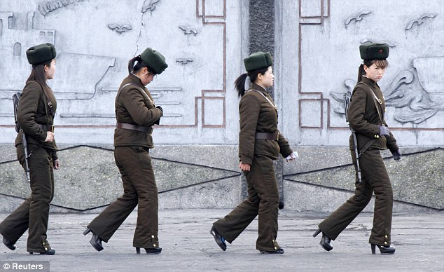 North Korean female soldiers strutting their stuff in style / Credit: Reuters